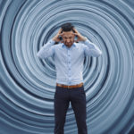 Businessman against vortex background