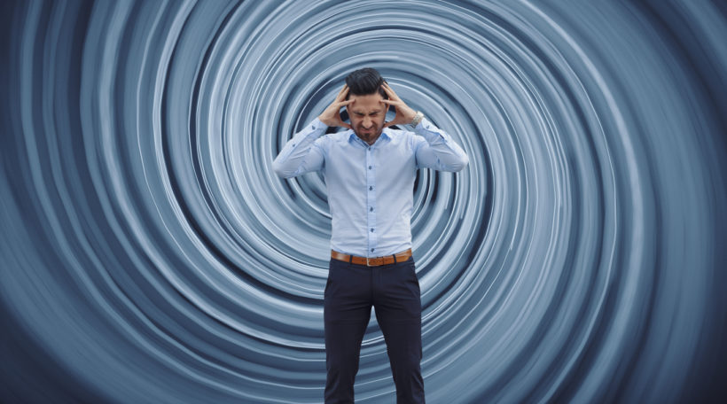 Businessman against vortex background